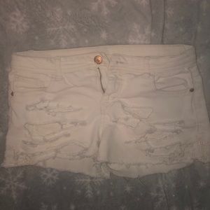 white ripped jean shorts